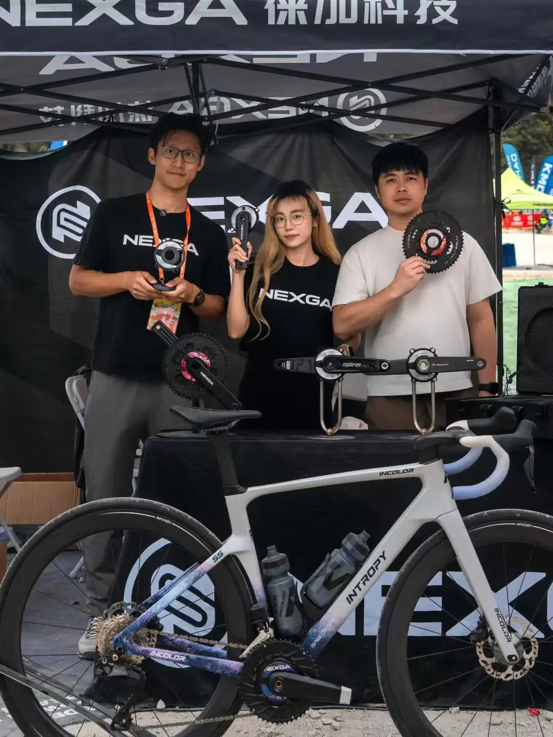NEXGA team members at a cycling event